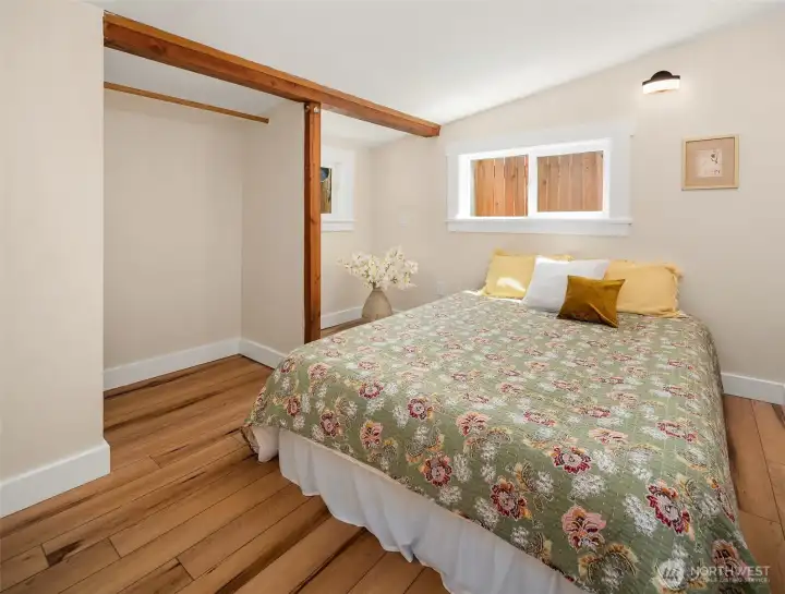 Yes, the queen bed will fit! This bedroom is so cozy!