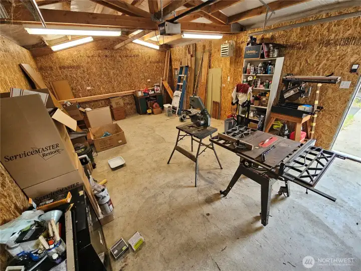Inside the shop with plenty of room for storage and hobbies.