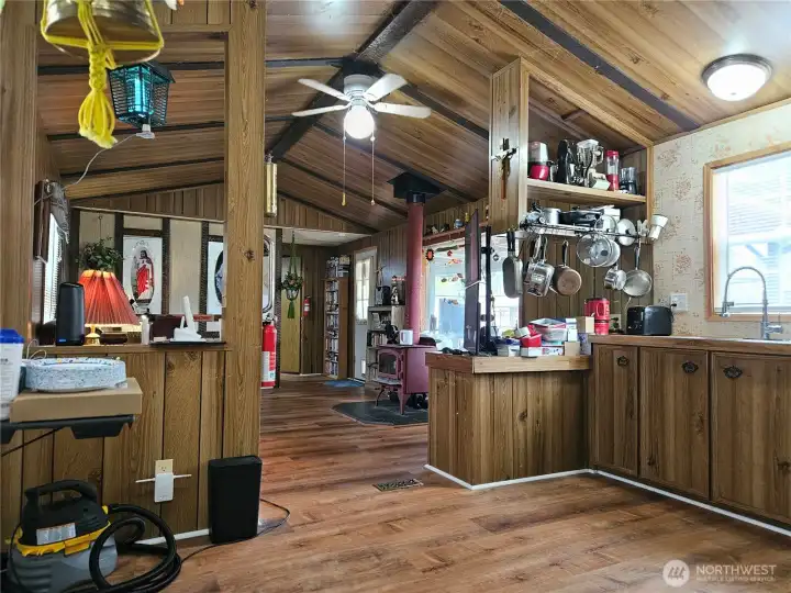 Open kitchen with eating-area leads into the living room.
