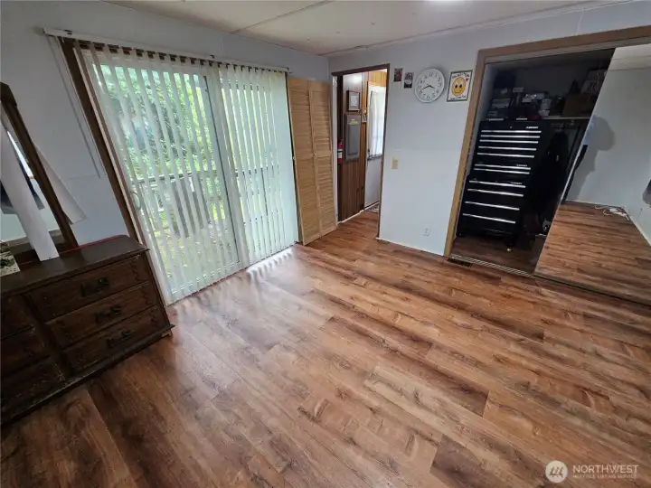 Huge primary bedroom with lots of light.