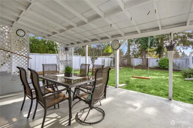 The covered back patio allows you to enjoy your private and quiet backyard all year round.