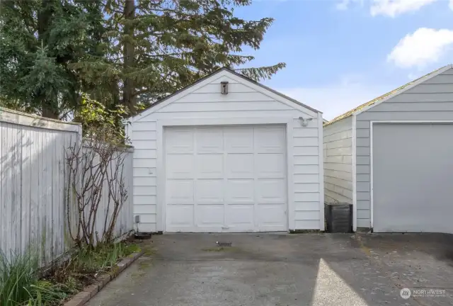 Detached one-car garage with automatic opener plus one off street parking spot in front of the garage.