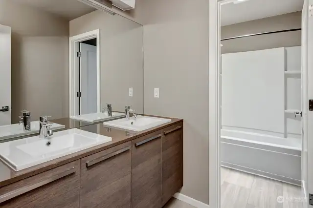 Upper Level Hall Bath with new flooring.