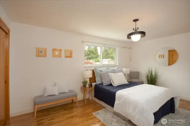 1st bedroom to the left of the landing as you walk upstairs. Full closet is big enough to walk in. Queen size bed and still so much room!