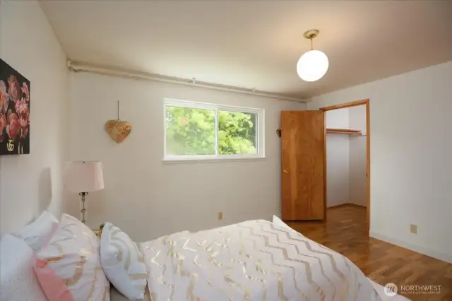This bedroom has two closest one of which is a walk in!