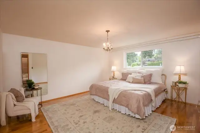 The Primary Suite has a King size bed and look at all the room!  You could capture the room next store and all a 5 piece bath and dream closet!  You would still have a 4 bed house!