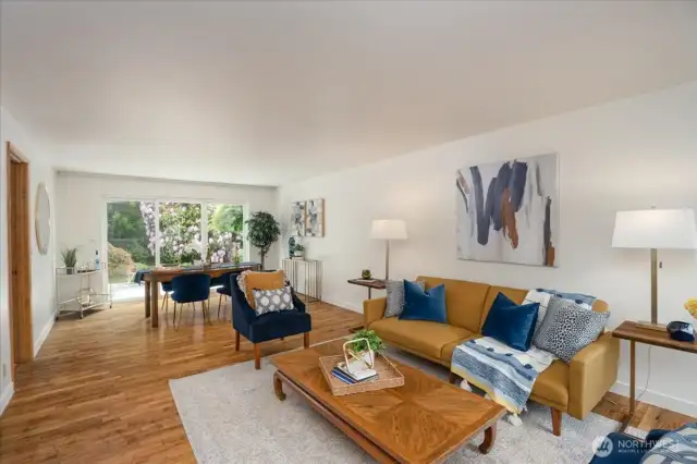 Enjoy original oak hardwood floors in mint condition! New baseboards and fresh paint make this home move in ready. Oversized slider allows light to flow through the home...brining nature with it.