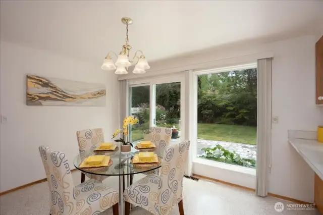 Eat in space in the kitchen with access to back yard and double car garage.