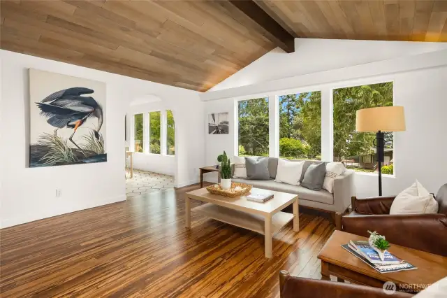 Beautiful T and G cedar vaulted ceilings, bamboo floors and large window create an airy and open feeling.