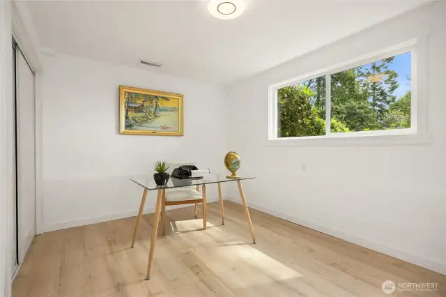 Home office is tucked in a quiet area of the home.
