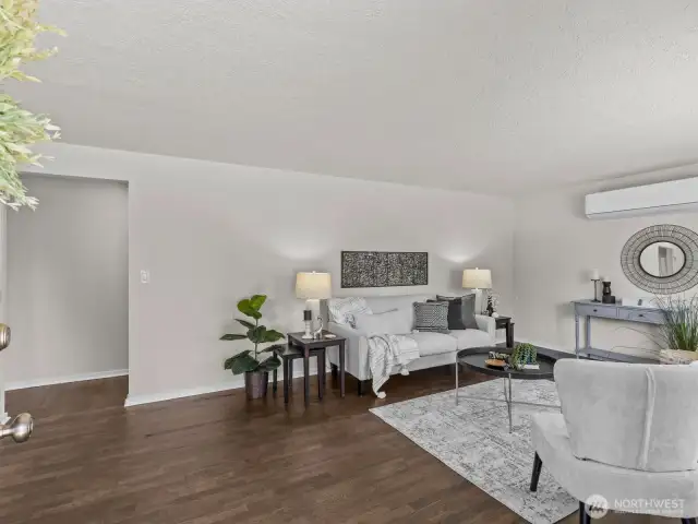 Dark, rich, original hardwood floors were beautifully refinished.