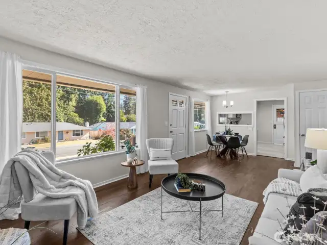 Large windows in every room allow an abundance of natural light to penetrate the home and reflect beautifully off the fresh interior paint.