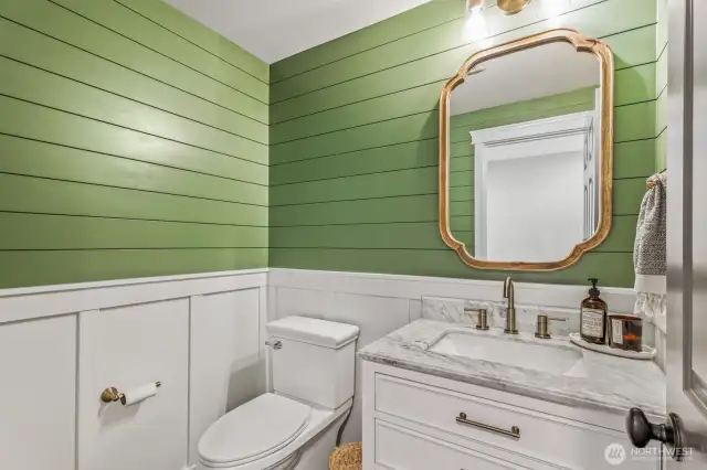 This super cute powder room on the main floor was remodeled in 2023 with all-new everything!