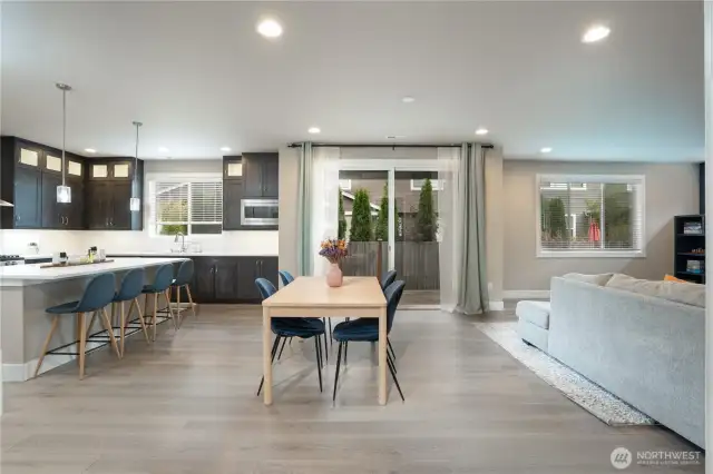 Wow! Wow! Wow! Walk into your expansive kitchen and eating area with room for lots of entertaining or just quaint nights at home. HUGE island with quarts and tons of storage in the plethora of cabinets.
