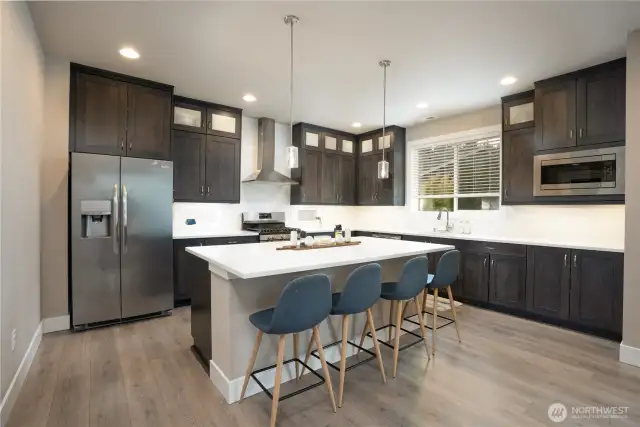 Cabinets all the way to the ceiling to maximize storage.