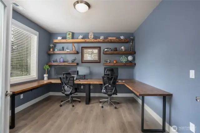Awesome home office!! Built in shelves and beautiful desks