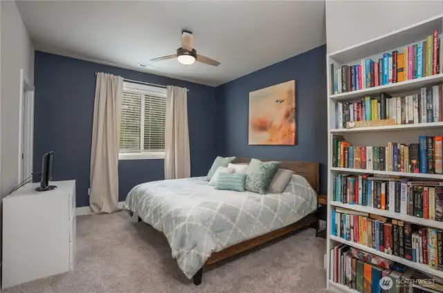 Main floor bedroom with a nice walk in closet