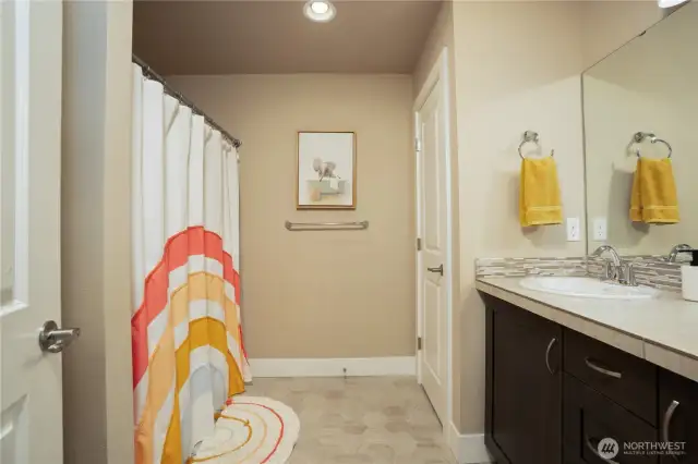 Secondary bathroom upstairs for guests and additional family.