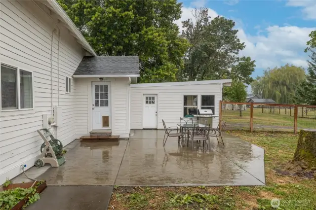 Large stamped patio off utility/mud room & garage