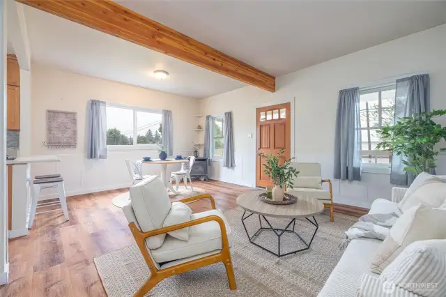 Open & bright living room and dining w/beautiful LVP flooring