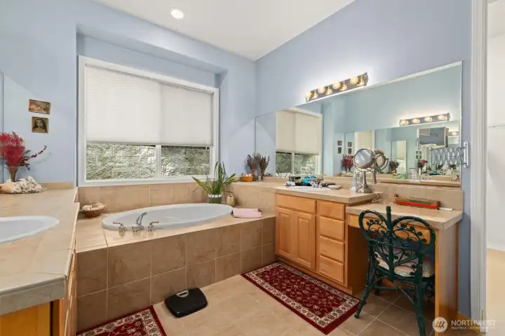 Dual vanities, independent of one and other, ensures that everyone has plenty of room to get ready in the morning!