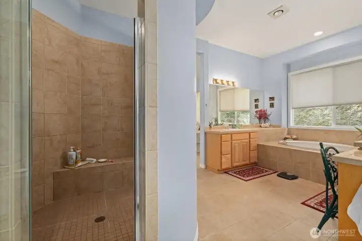The oversized shower, with tile surround, is simple to walk-in and has plenty of room!