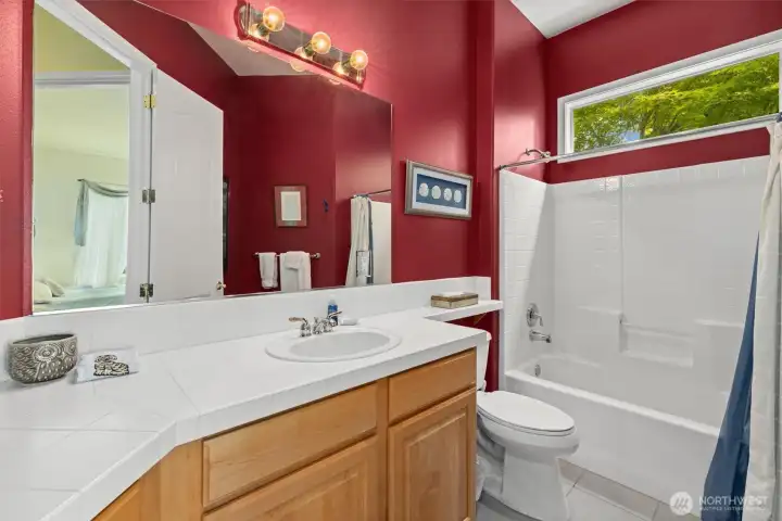 The aforementioned adjacent full bathroom.