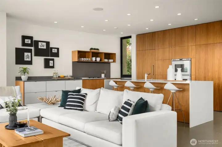 Artisan walnut woodwork reveals a hand-selected grain that flows seamlessly from room to room, wrapping the home in warmth and timeless elegance.