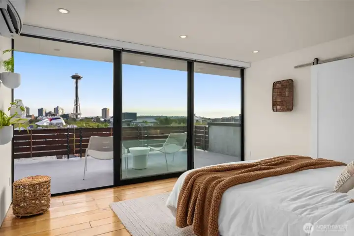 Awaken to an icon — the Space Needle framed perfectly beyond your bed, as though the city belongs to you alone.