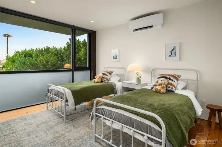 Guest suite where greenery frames the view — a calming escape that feels tucked away yet deeply connected.