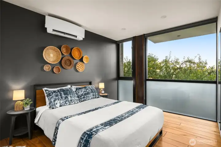 Another guest suite, warm with layered textures and light — hospitality at the level of boutique hotel comfort.