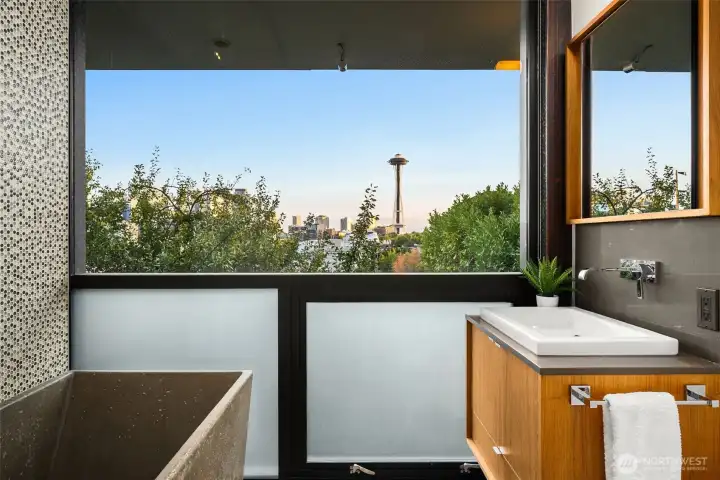 From here, even secondary bathrooms hold commanding views — a reminder that this home never compromises.