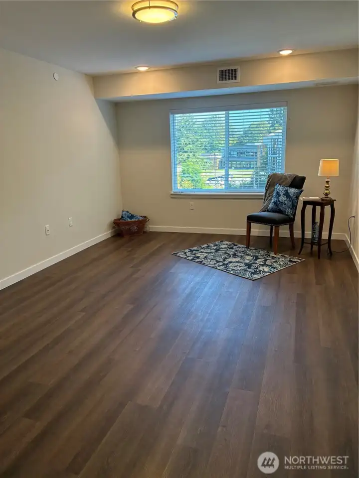 Primary bedroom suite, all rooms with easy care vinyl plank flooring.