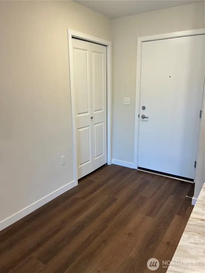 Entry closet pictured on left of main door. The main entrance to your suite has peep hole and dead bolt.