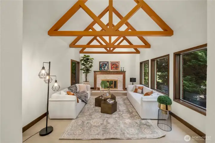 The living room showcases fine wood framing and rich architectural detail