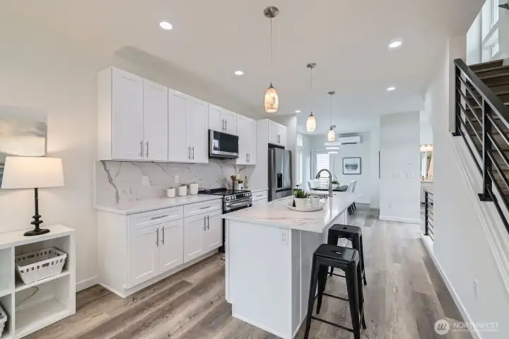 Another great kitchen view. Quiet Ductless AC on this level and the upper level to keep you warm or cool depending on the season.