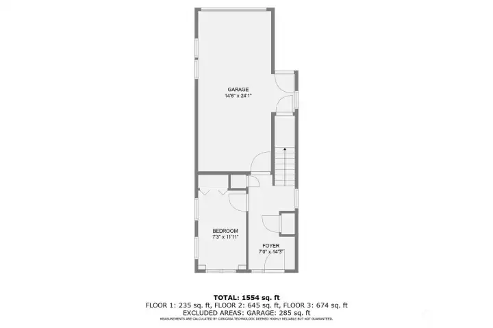 Entry level bedroom and garage (first floor).