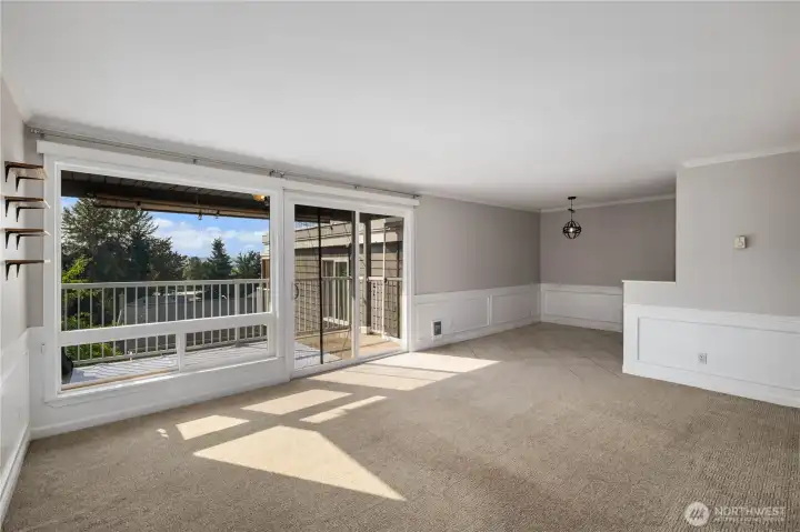 Living Room & Balcony View: Expansive windows bring in abundant natural light and showcase the surrounding greenery. The covered balcony extends your living space outdoors, ideal for morning coffee or evening sunsets.