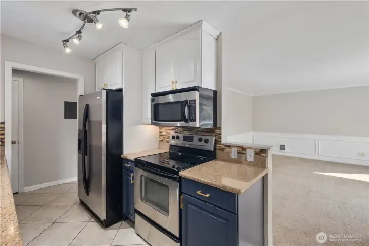 Kitchen & Living Connection: Kitchen opens seamlessly toward the living room, keeping the main living spaces connected. Ideal for entertaining or casual meals while enjoying the natural light from the balcony.