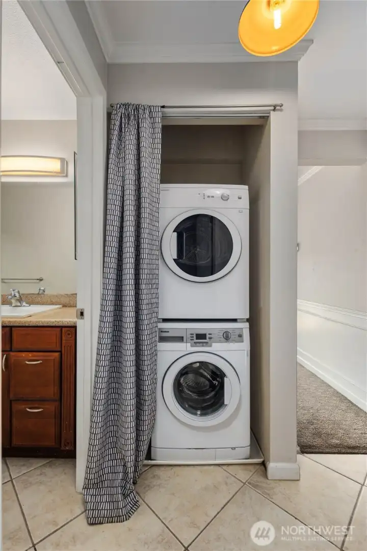 Laundry: In-unit washer and dryer conveniently located near the bathroom and bedrooms. Everyday convenience in a well-designed layout.