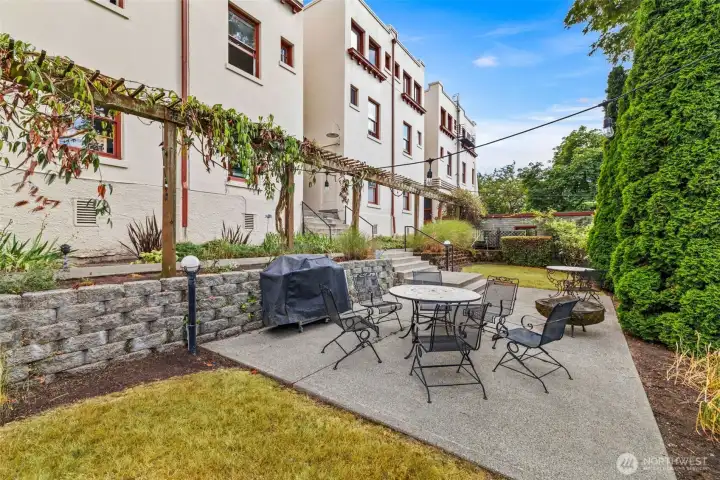 This shared patio feels like a European garden escape