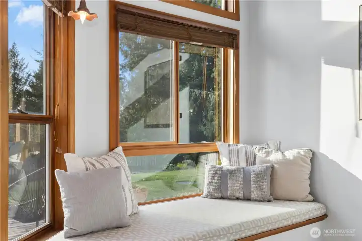 The sweet window seat. The perfect spot to curl up with a good book.