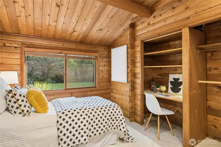 Heading over to the east side of the home and the first of two additional bedrooms.