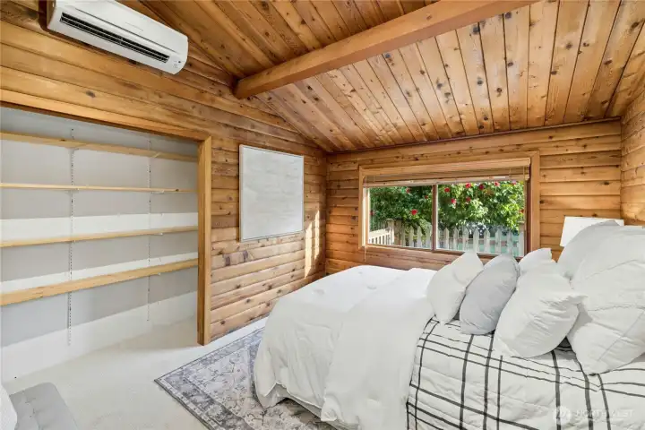 The third bedroom. The home has a a mini-split system for heating and cooling. There are also wall heaters still in service.