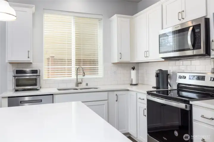 Quartz countertops and subway tile spash