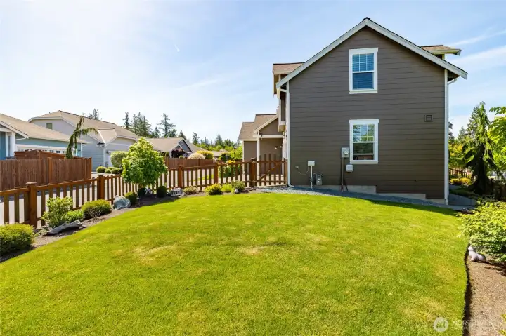 View of the beautiful private lawn and gardens to enjoy!