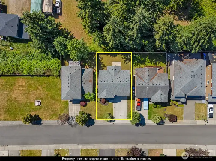 A backdrop of trees behind the house offers exceptional privacy and a peaceful setting.