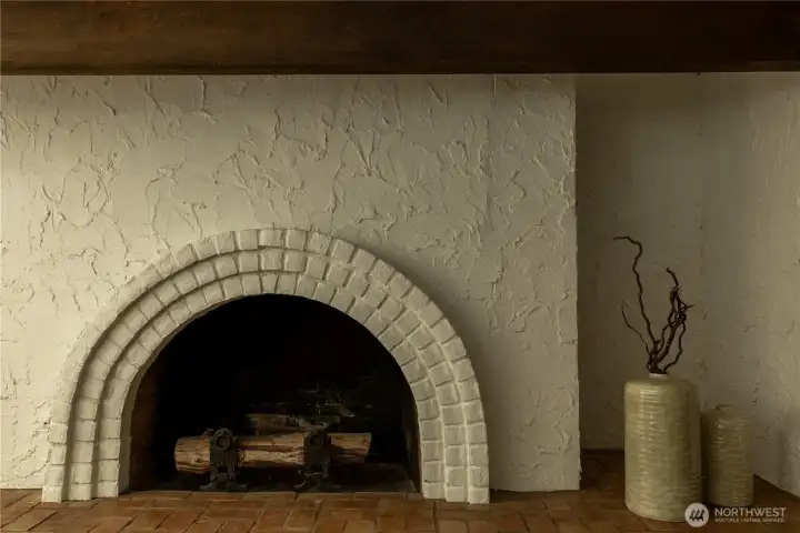 Lower level wood burning fireplace
