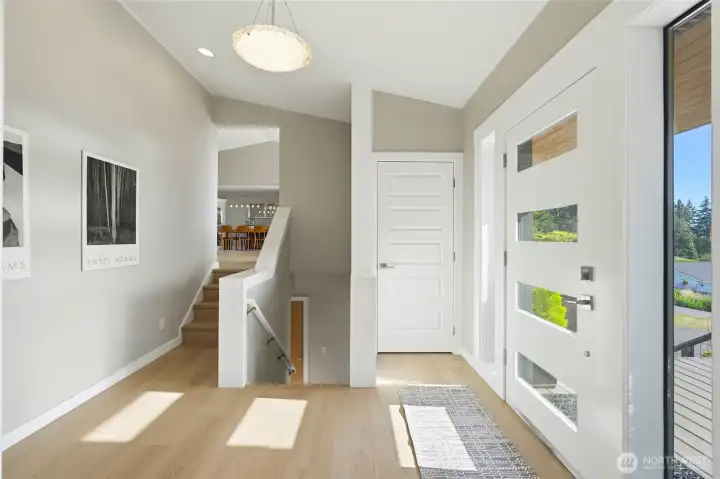 Entryway with stairways, and closet