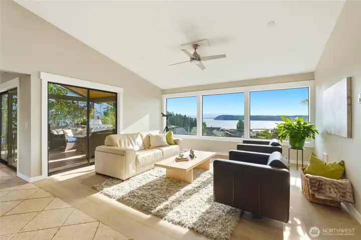 Great room living area with Puget Sound view and covered entertainment deck